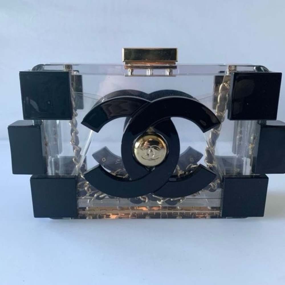 CHANEL Transparent Clutch with Black and Gold Accents